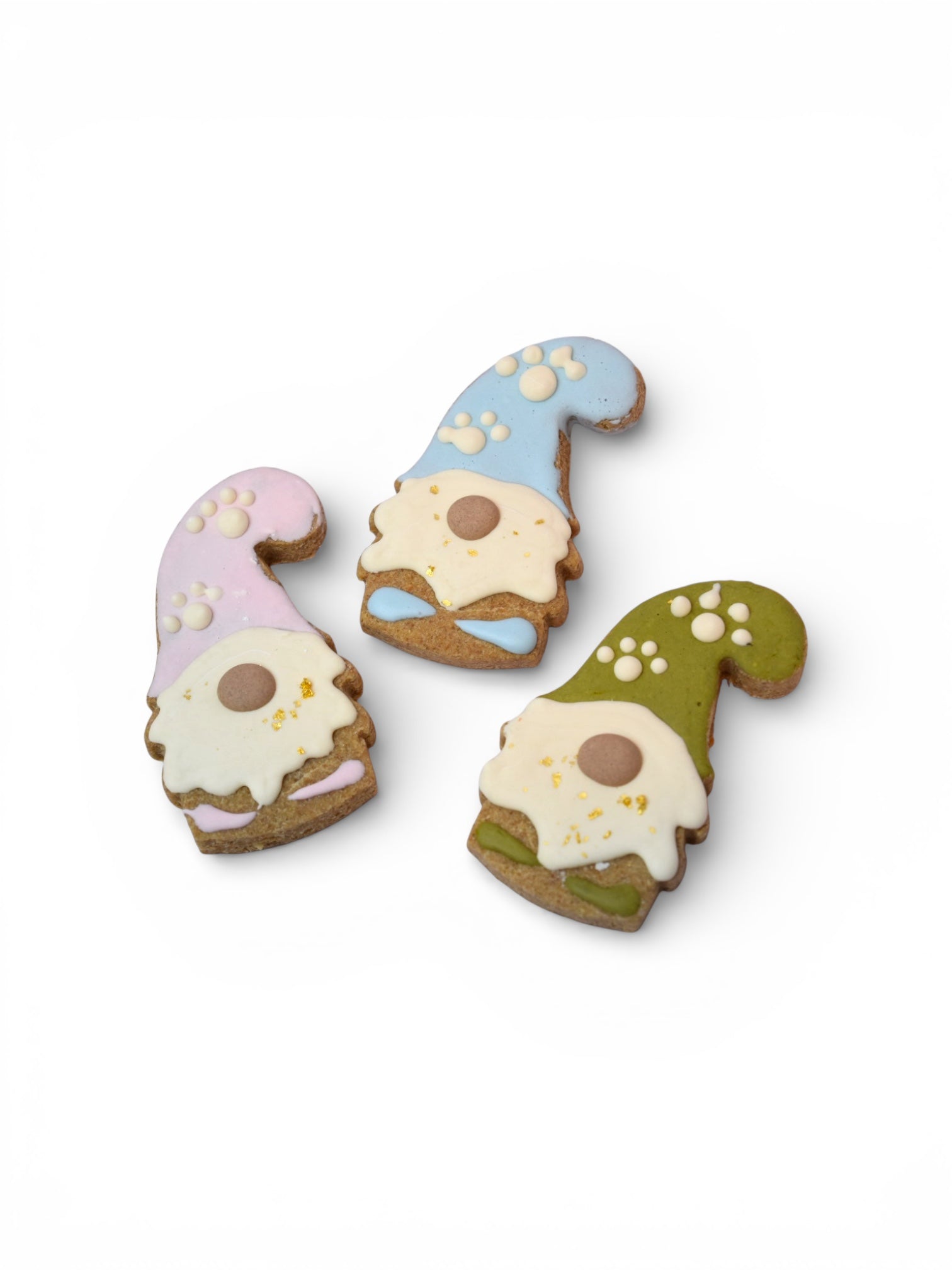 Spring gnome dog treats made in Montana with Big Prairie Peanut Butter, yogurt-based icing colored with natural fruit and vegetable ingredients, and 23-carat edible gold flakes.